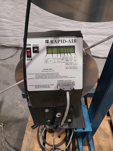 Used Rapid Air Industries Dual Motorized Stock Feed Reels with Antenna Feed Control. 