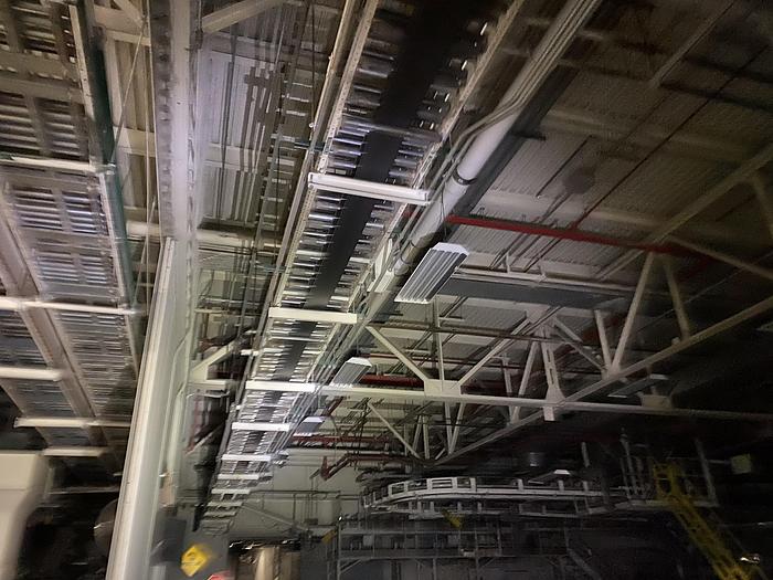 Used 1000’ OF ROLLER CONVEYOR WITH CURVING TRACK