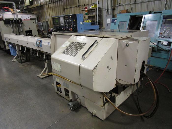 1996 Wasino SM-10B CNC lathe with sub-spindle, Y-axis cross milling spindle, and bar loader