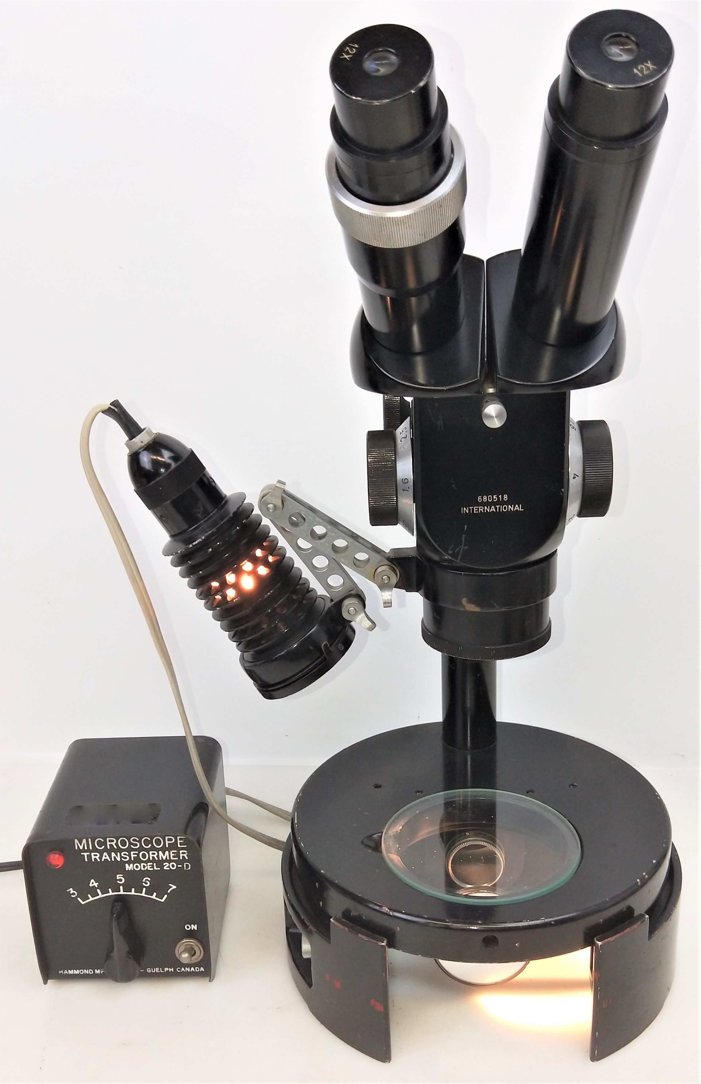 Used International Binocular Stereo Microscope with Variable Transformer and Lamp - 7.56X to 48X