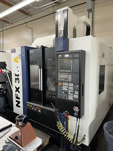 Used 2019 YCM MDL NFX 380A 5TH CNC VMC
