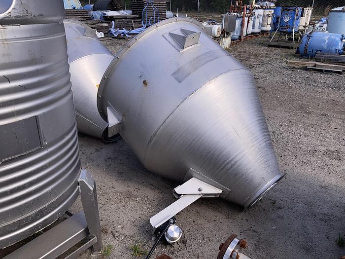 Used Used approximately 275 gallon stainless steel vertical tank