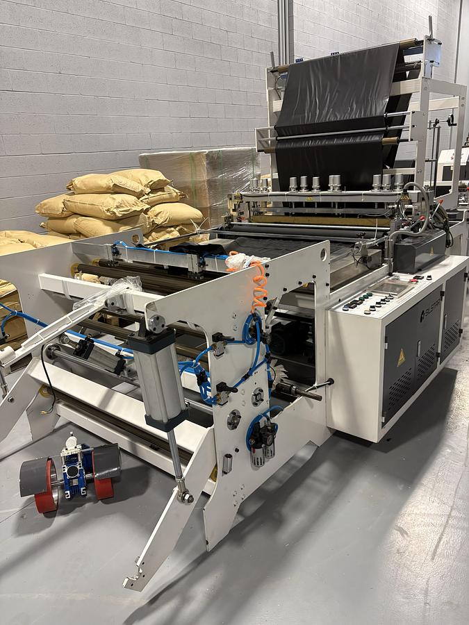 Used Silstar GBDR-1000 Interleaf S-Type Garbage Bag Making Machine – NEW