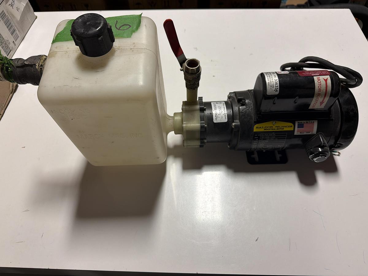 Used Industrial electric pump with integrated reservoir
