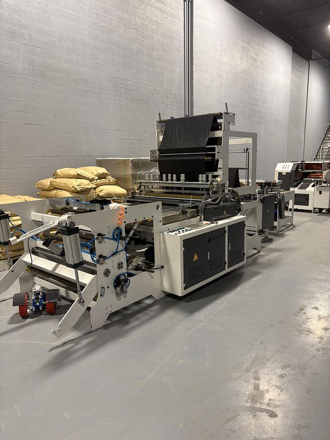 Used Silstar GBDR-1000 Interleaf S-Type Garbage Bag Making Machine – NEW