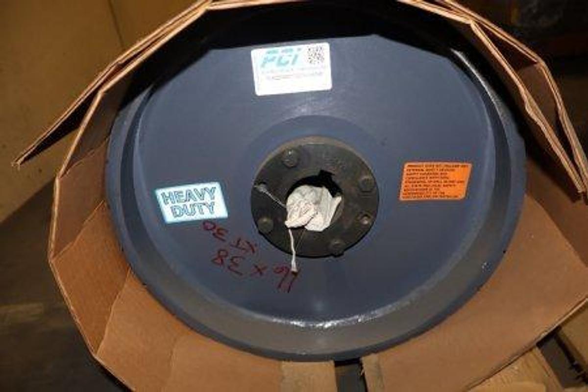 Used PCI heavy-duty conveyor pulley. Features a 16" diameter and 38" face