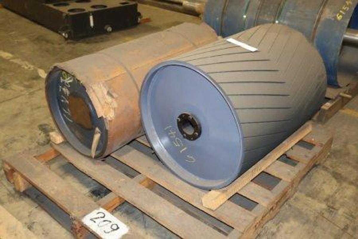 Used Conveyor pulleys. Includes (1) PCI heavy-duty pulley with chevron rubber lagging (20-3/4" Dia x 26"W) and (1) wrapped pulley (16" Dia x 32"W).