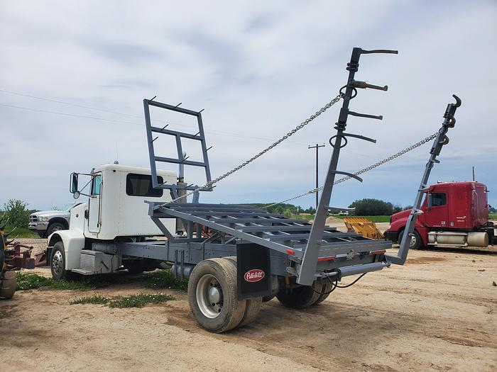 Used 1990 Peterbilt w/ New Holland 1051 Stack Retriever