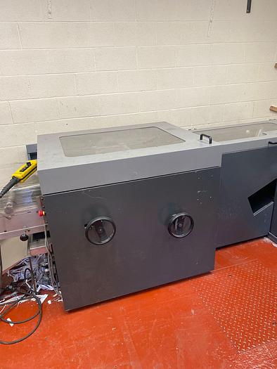 Used HEIDELBERG ST100 6 Station Chain, 6 x Auto Feeders, 1 x Cover Feeder, ST100 Stitching Unit, Three Knife Trimmer, Rima Stacker Delivery