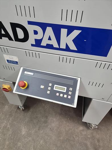 Used Adpak Fd560FA Shrink wrap machine with heat tunnel, L sealer 