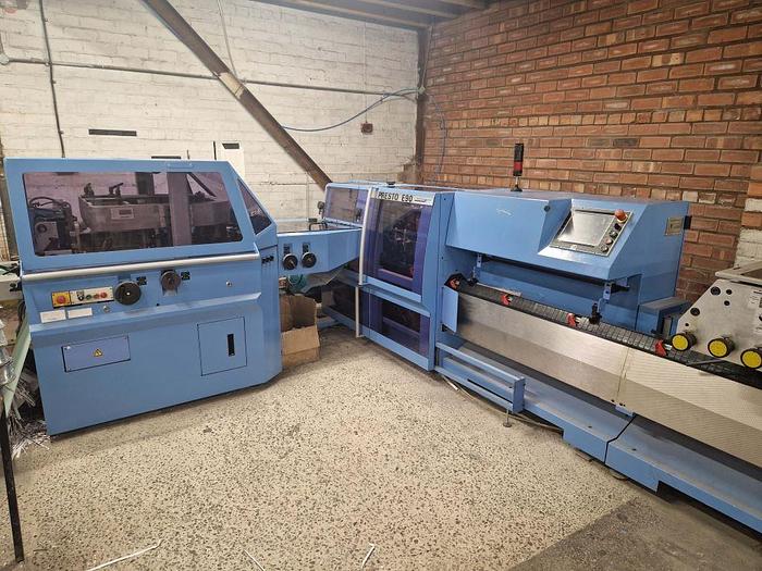 Used 2009 MULLER MARTINI E90 8 Station Chain, 8 x 1555 Feeders, 1528 Cover Feeder, E90 Stitching Unit, Three Knife Trimmer, Shingle Belt Delivery 