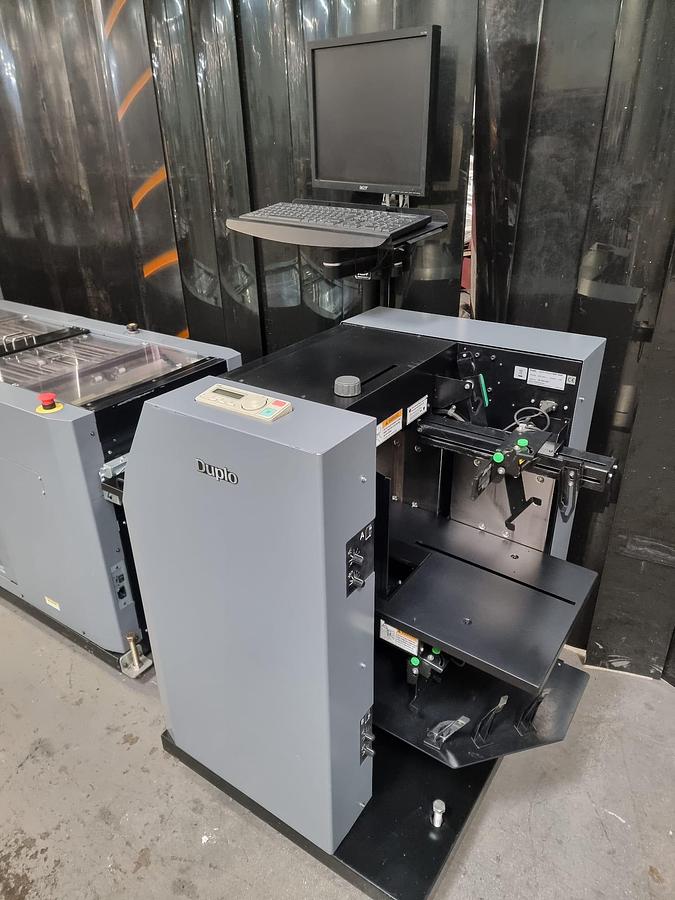 Used Duplo 5000 sheet feeder , fold , stitch , trim crease booklet maker