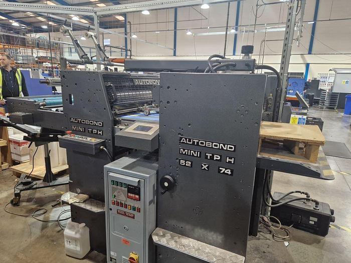 Used 2005 AUTOBOND MINI 74TPH Thermal Laminator, Sheet Size: 54 x 74cm, Heidelberg Deep Pile Stream Feeder, Film Unwind, Tool Temp Exchanger, Auto Sheeter, Jogger Delivery