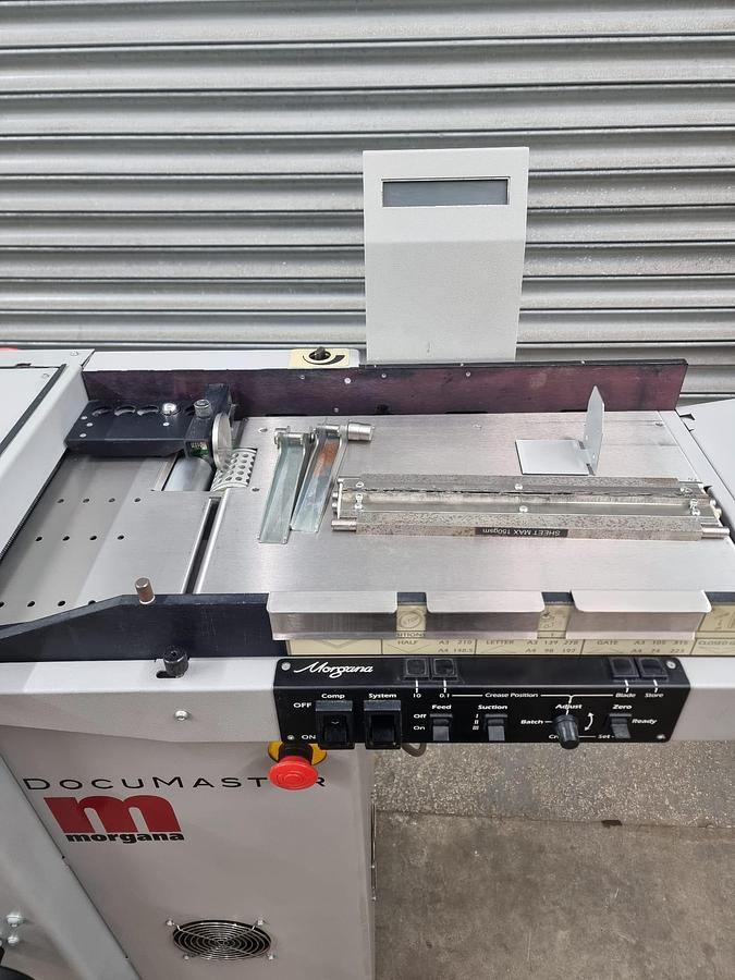 Used Morgana Autocreaser crease and perf for printing