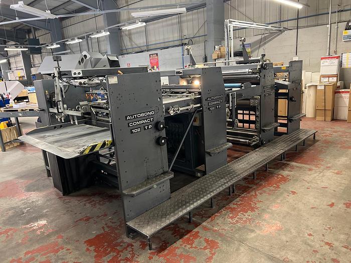 Used 2004 AUTOBOND 102 COMPACT Thermal Laminator, Sheet Size 72 x 102cm, Heidelberg Deep Pile Stream Feeder, Double Sided Laminator, 2 x Film Unwinds, Tool Temp Unit, Auto Sheeter, Deep Pile Stacker Delivery