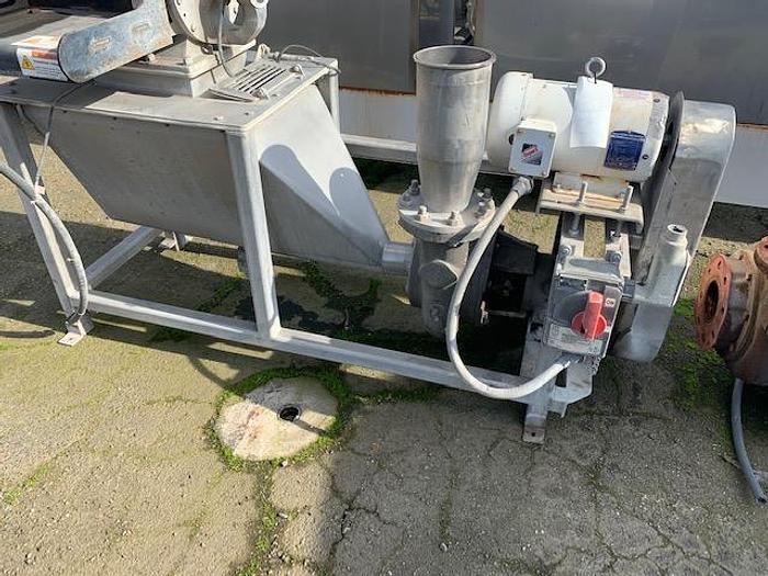 Used Stainless Steel Metering Hopper Feeding a Cornell 4" Hydro Food Pump