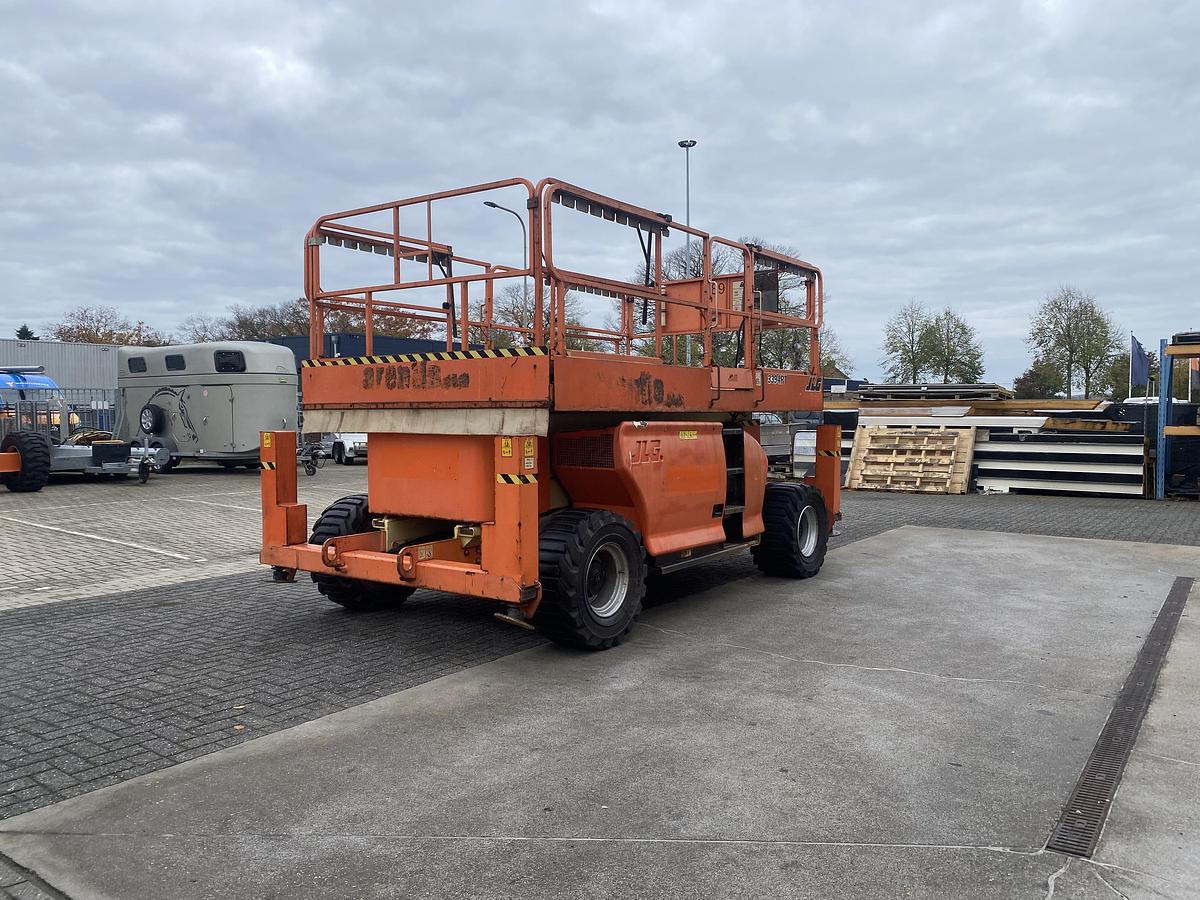 Gebruikt 2011 JLG 3394RT, Schaar hoogwerker, 4x4