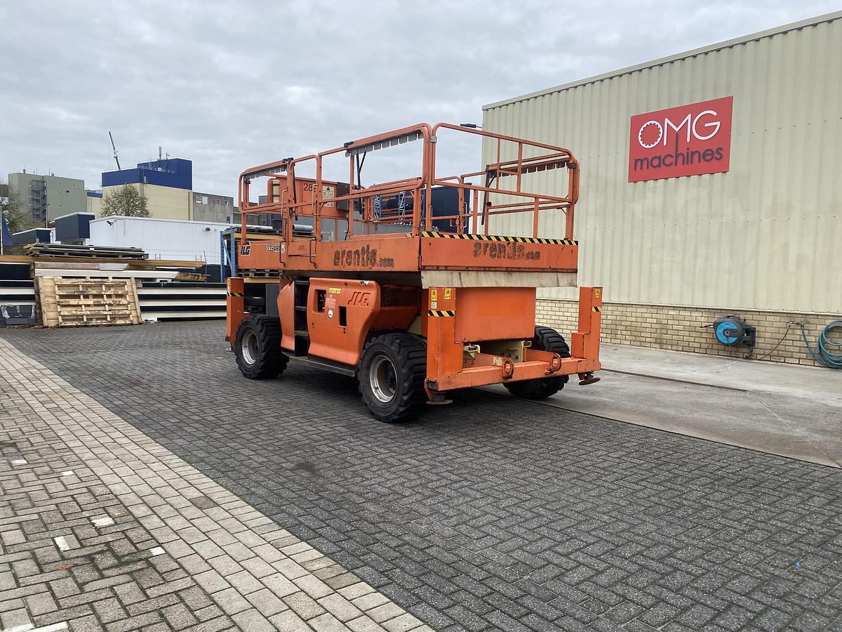 Gebruikt 2011 JLG 3394RT, Schaar hoogwerker, 4x4