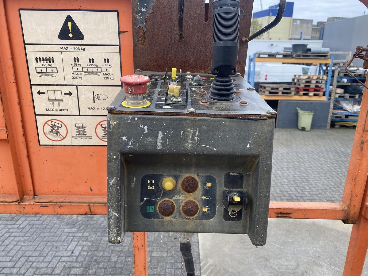 Gebruikt 2011 JLG 3394RT, Schaar hoogwerker, 4x4