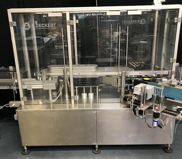 Used M 157836 D - Round bottle labeller DECKERT DEM 1000+