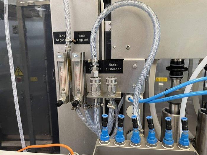 Used J 16159 D - Liquid Filling and Closing Line GRONINGER DFV 6000 - DECKERT AVR 200