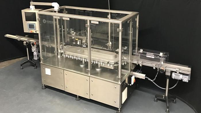 Used M 157836 D - Round bottle labeller DECKERT DEM 1000+