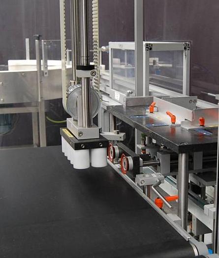 Used N 14816 D - OLI 210 V bottle case packer with GARVENS XE 40 checkweigher