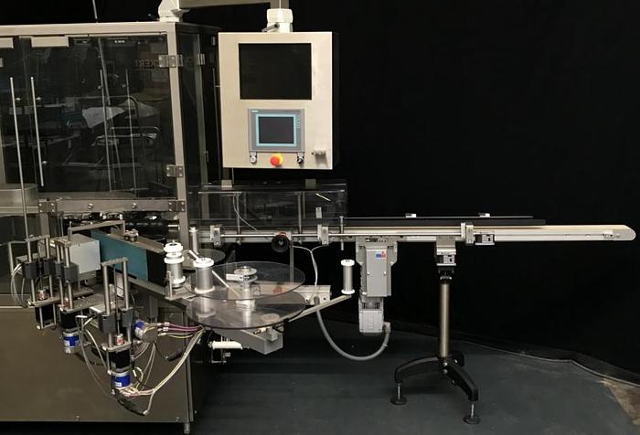 Used M 157836 D - Round bottle labeller DECKERT DEM 1000+