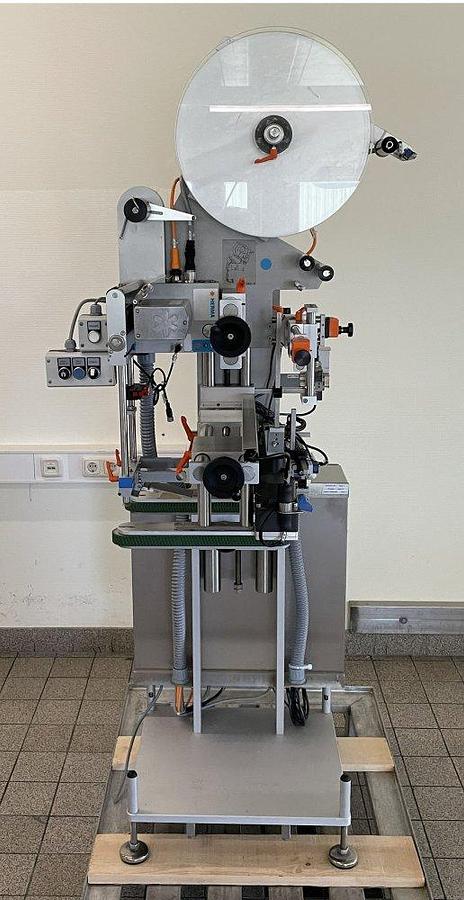 Used M 17252 D - Sonder Top labeller with side belts HERMA 400