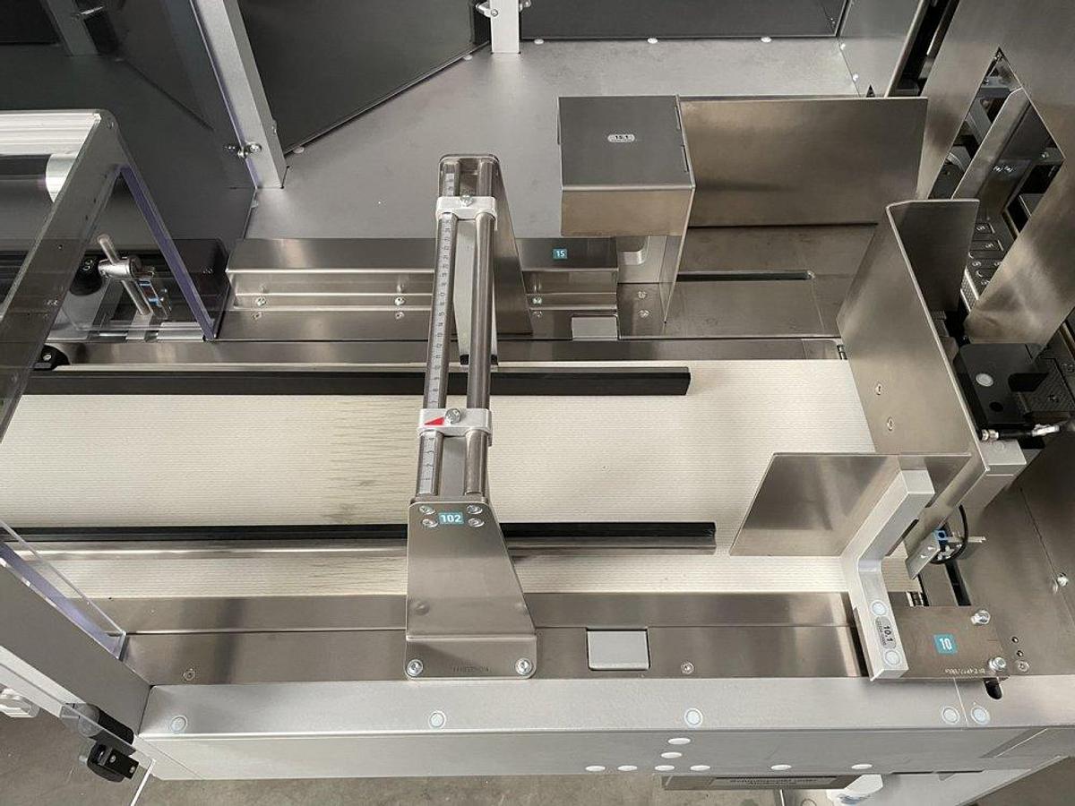 Used O 17302 D - full wrapping machine with PEWO-COLLECT grouping table PESTER PEWOFOLD 2