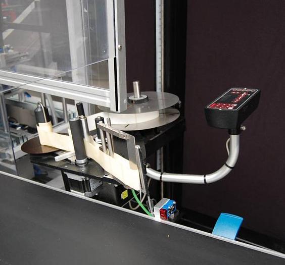 Used N 14816 D - OLI 210 V bottle case packer with GARVENS XE 40 checkweigher