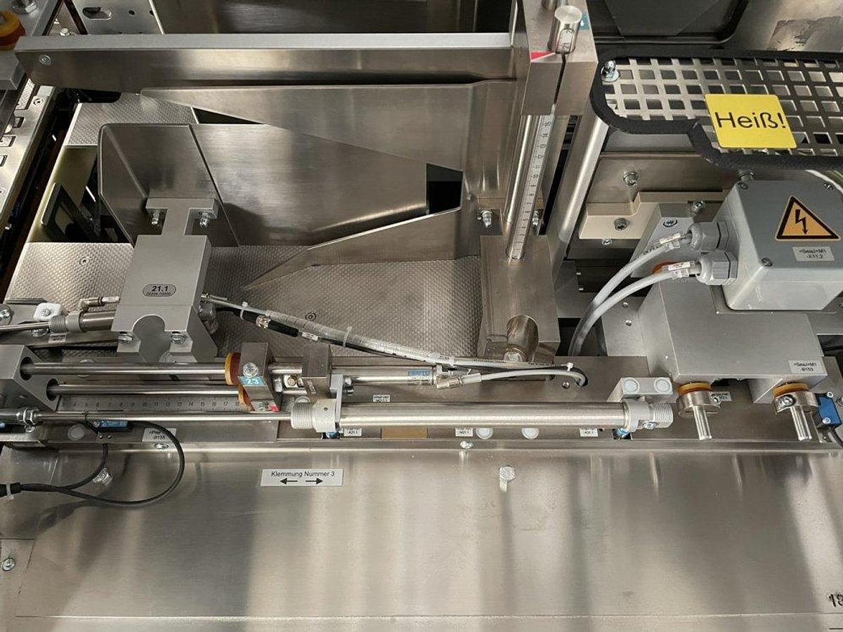 Used O 17302 D - full wrapping machine with PEWO-COLLECT grouping table PESTER PEWOFOLD 2