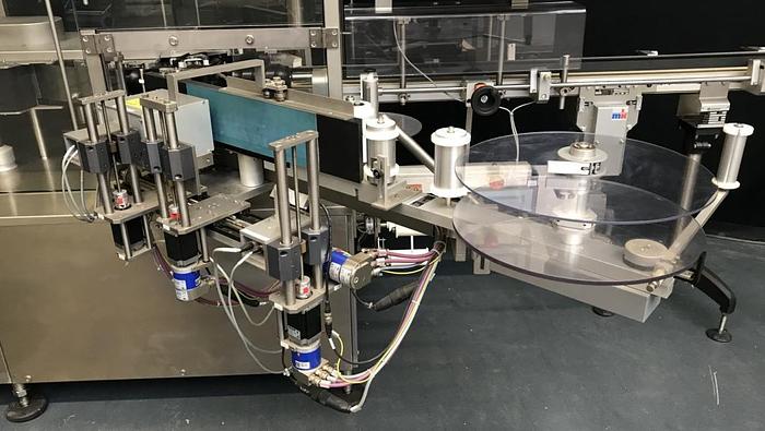 Used M 157836 D - Round bottle labeller DECKERT DEM 1000+