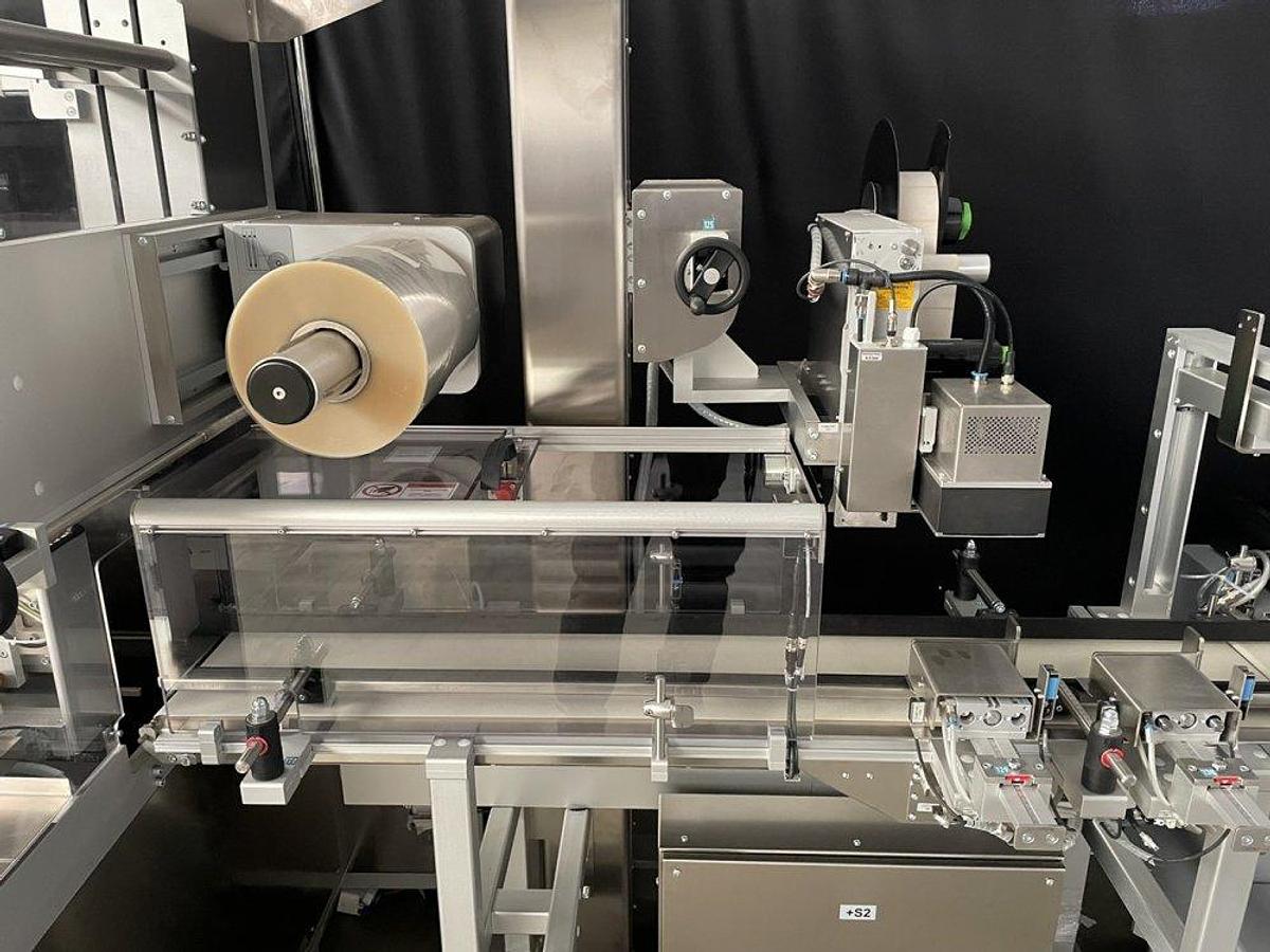 Used O 17302 D - full wrapping machine with PEWO-COLLECT grouping table PESTER PEWOFOLD 2