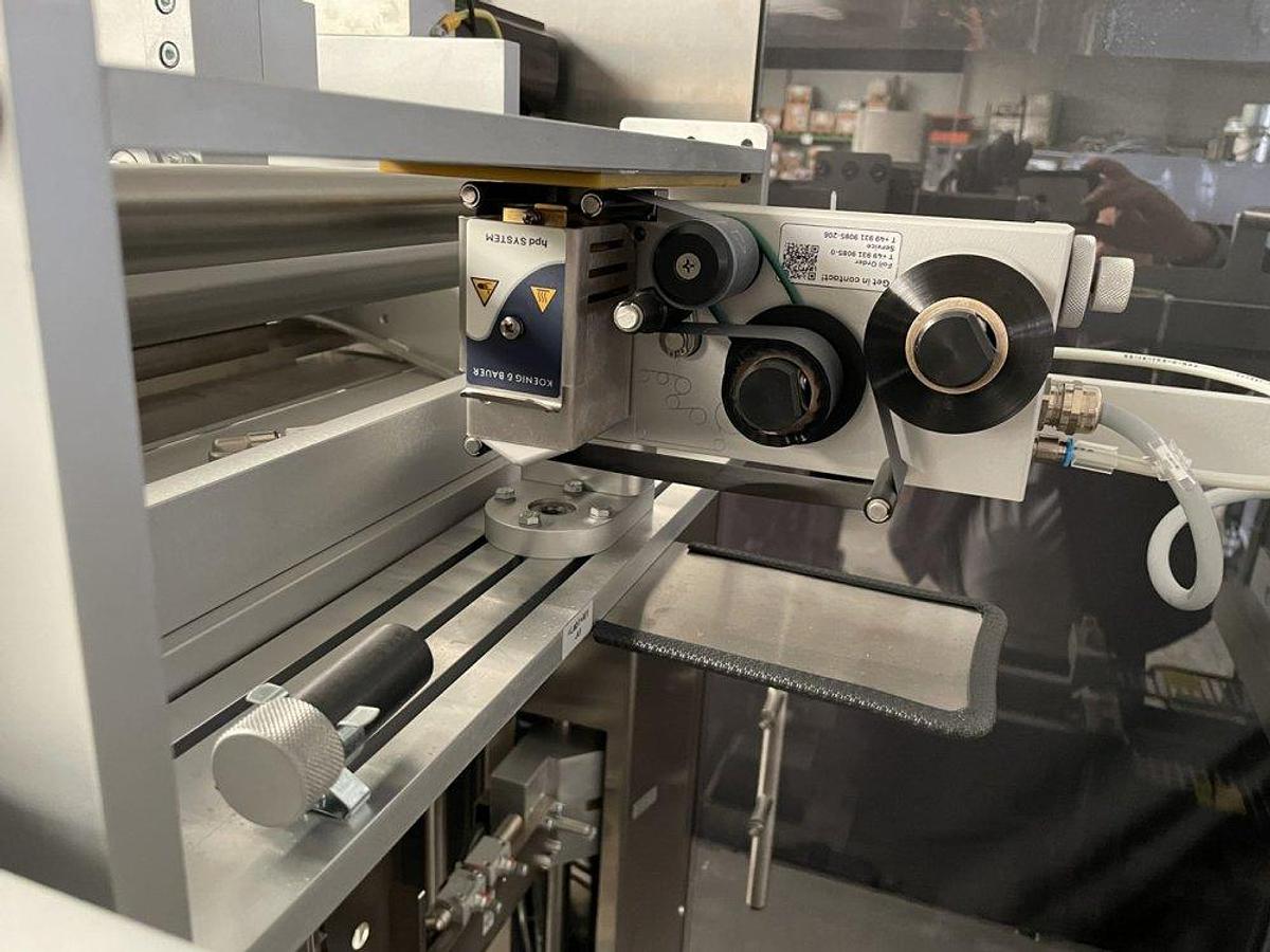 Used O 17302 D - full wrapping machine with PEWO-COLLECT grouping table PESTER PEWOFOLD 2