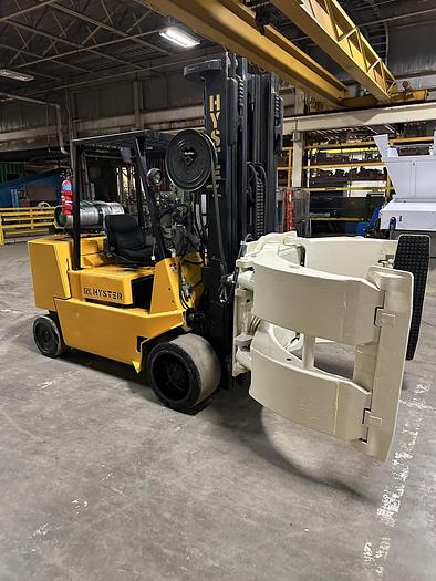 Used 12,000 POUND CAPACITY HYSTER MODEL S120XL2S PAPER ROLL CLAMP TRUCK pending JE