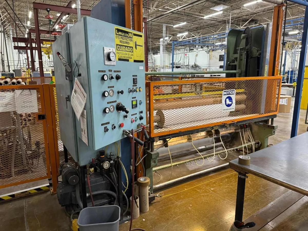 Used 84" WIDE SHANKS TWO DRUM SLITTER REWINDER WITH SHAFTLESS FLOOR PICK UP UNWIND STAND