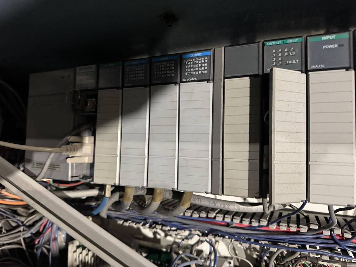 Used 72" WIDE JENNERJAHN MODEL SRA-72 COUNTER ROLL SLITTER REWINDER