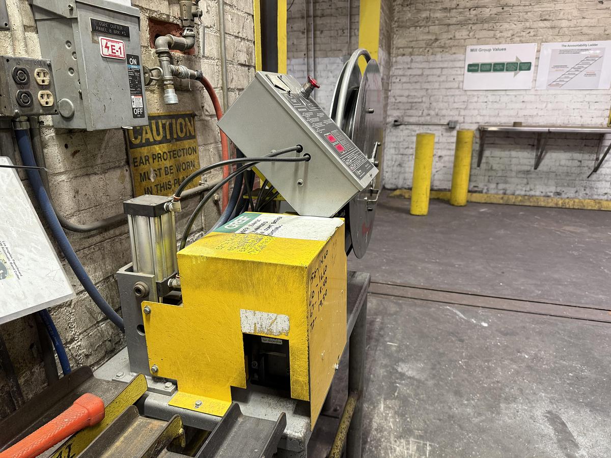 Used TRIANGLE STRAPPING EQUIPMENT TECHNOLOGIES  MODEL 440 "CTL" STRAP CUT TO SIZE UNIT