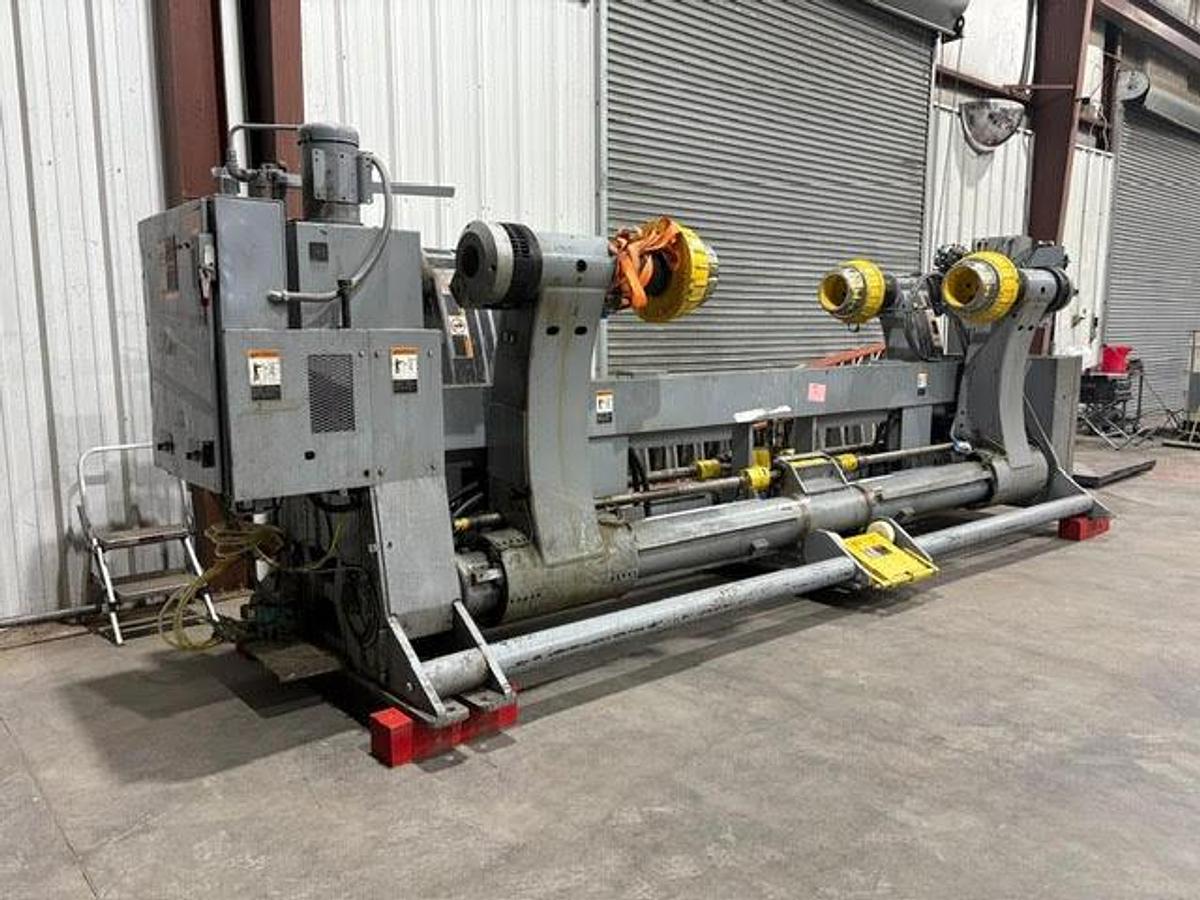 Used MARQUIP 72" X 72" DUAL SHAFTLESS FLOOR PICKUP UNWIND STAND 1999