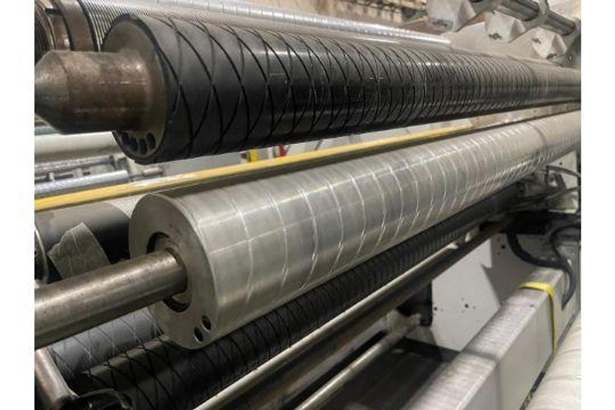 Used 58" WIDE COMEXI TURRET REWIND WITH SPLICING 32" DIAMETER