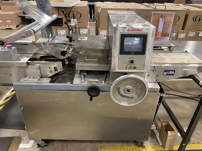 Used AMERIPAK # 40 HORIZONTAL WRAPPER w/ 6’ SS LUGGED INFEED CONVEYOR