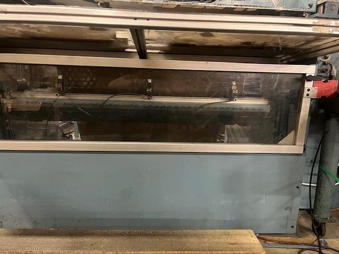 Used 54" JENNERJAHN COUNTER ROLL REWINDER WITH SLITTING REBUILT 2006