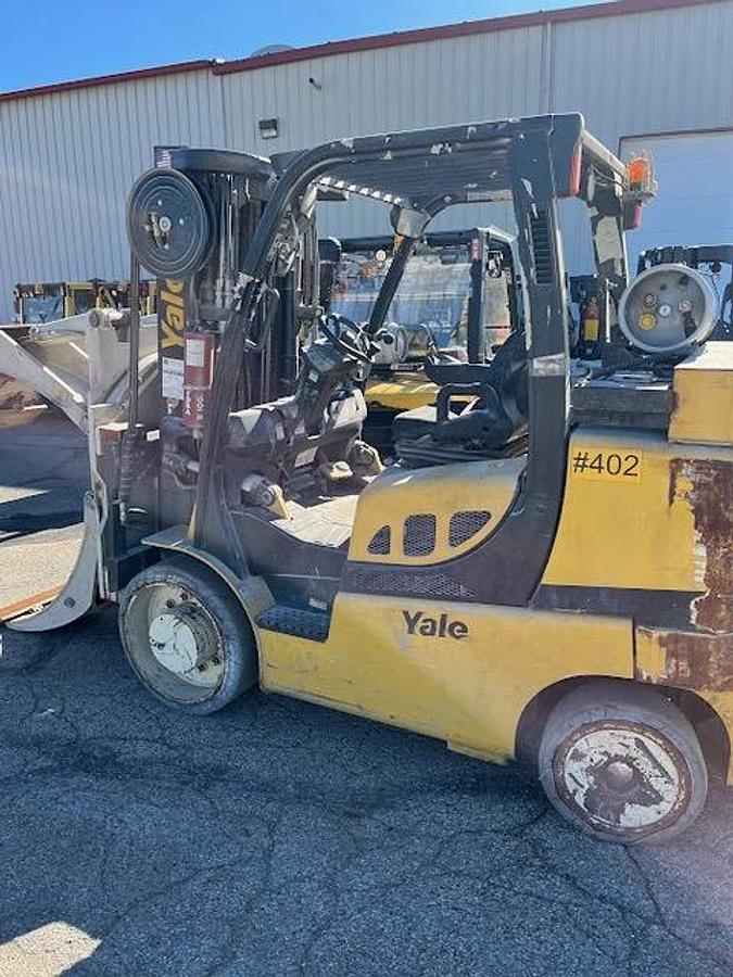 Used 15,500 POUND YALE FORKLIFT MODEL GLC155 WITH 84" CASCADE PAPER ROLL CLAMP