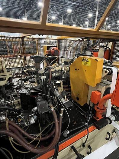 Used PAPER MACHIENRY CORPORATION PMC-1000 12OZ CUPS