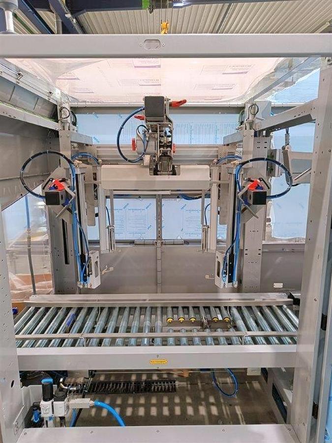 Used PATTYN HIGH-SPEED CASE ERECTING AND BAG INSERTING AUTOMATED PACKAGING SYSTEM