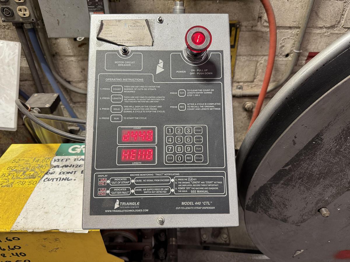 Used TRIANGLE STRAPPING EQUIPMENT TECHNOLOGIES  MODEL 440 "CTL" STRAP CUT TO SIZE UNIT