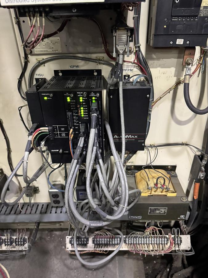 Used 95" WIDE A&F TWO DRUM SLITTER REWINDER - SHAFTLESS 72" DIAMETER REWIND