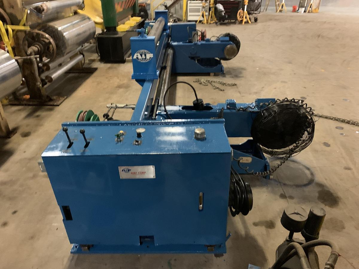 Used A & F MDL. RS-60  105" WIDE X 72" DIAMETER SHAFTLESS FLOOR PICKUP UNWIND STAND REBUILT 2013