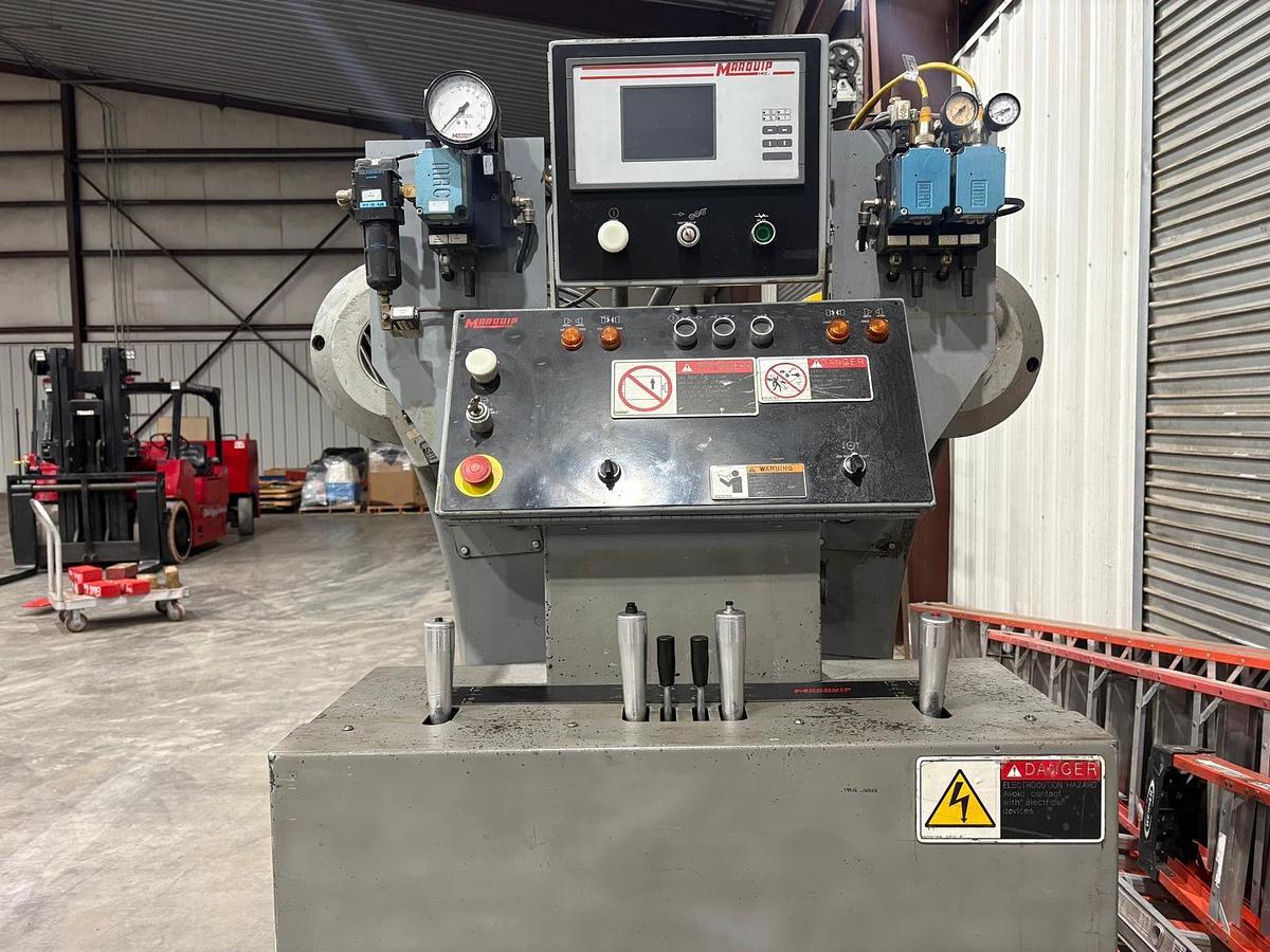 Used MARQUIP 72" X 72" DUAL SHAFTLESS FLOOR PICKUP UNWIND STAND 1999